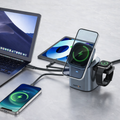 Magmore 6-in-1 wireless charging station charging an iPhone, Apple Watch, tablet, laptop and smartphone on a desk setup